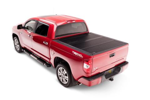 BAKFlip G2 Hard Folding Truck Bed Cover Rail Mounts Near Top of Bed Rail Rails Can Be Lowered Using Drop Down Brackets 2007-2021 Toyota Tundra 5 Foot 6 Inch Bed with Deck Rail System without Trail Special Edition Storage Boxes BAK