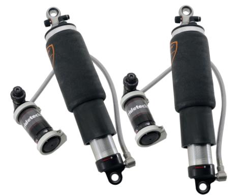 Rear TQ Shockwaves 8000 Series W/ 4.1 Inch Stroke 1.7 Inch Eye Pair Of Triple Adjustable Shock waves 5 Inch Rolling Sleeve W/ 1/4 Inch Fittings And Bearing Spacers 1/2 Inch And 5/8 Inch 10.75 Inch X 14.25 Inch W/ A 12.5 -12.75 Inch Ride Height Ridetech