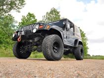 4 Inch Lift Kit M1 Jeep Wrangler TJ 4WD (1997-2002) Rough Country